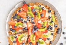 What’s For Snack? Fruit Pizza! Photo of a round fruit dessert cut into slices.