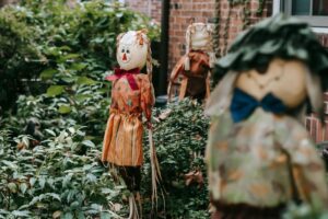 Scarecrows on a lawn