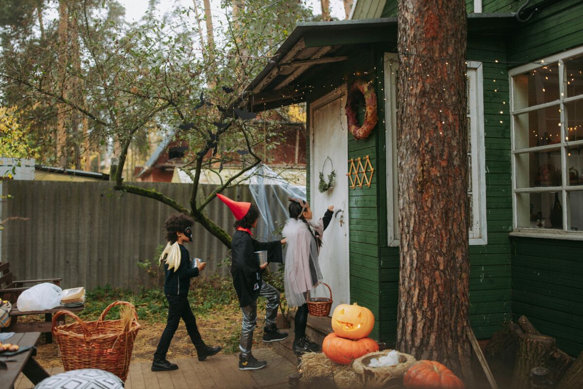 Kids in costumes trick-or-treating