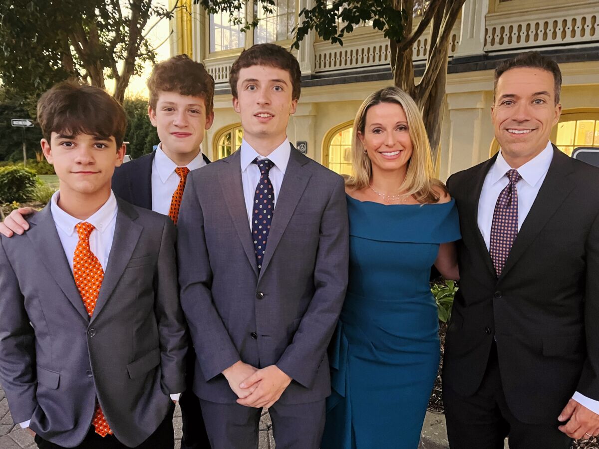 Julie Nogueira (second from right) and her family