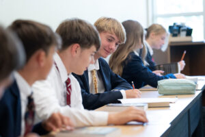 Severn School students sitting at a table