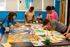 Children painting together