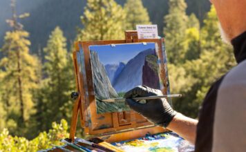 An artist plein air painting outside