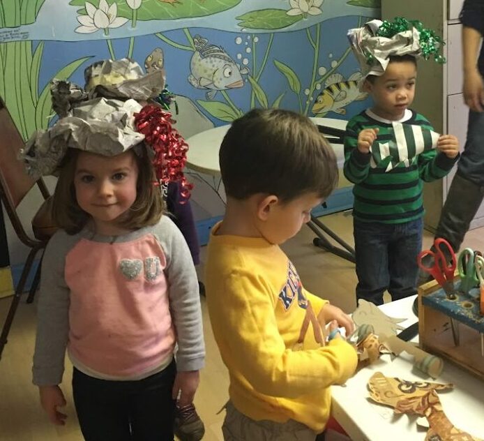 Crafting birthday hats at The Chesapeake Children's Museum