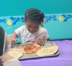 A make your own pizza party at the Chesapeake Children's Museum