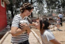 Things to do in the Chesapeake This Weekend: May 9-10 A mother holding a bunny as her daughter looks on at a petting zoo