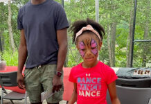 Weekend Fun in the Chesapeake: July 17-19 Girl in insect face paint looking at a display of bugs