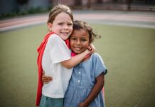 Two girls hugging
