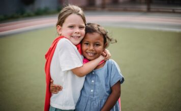 Two girls hugging
